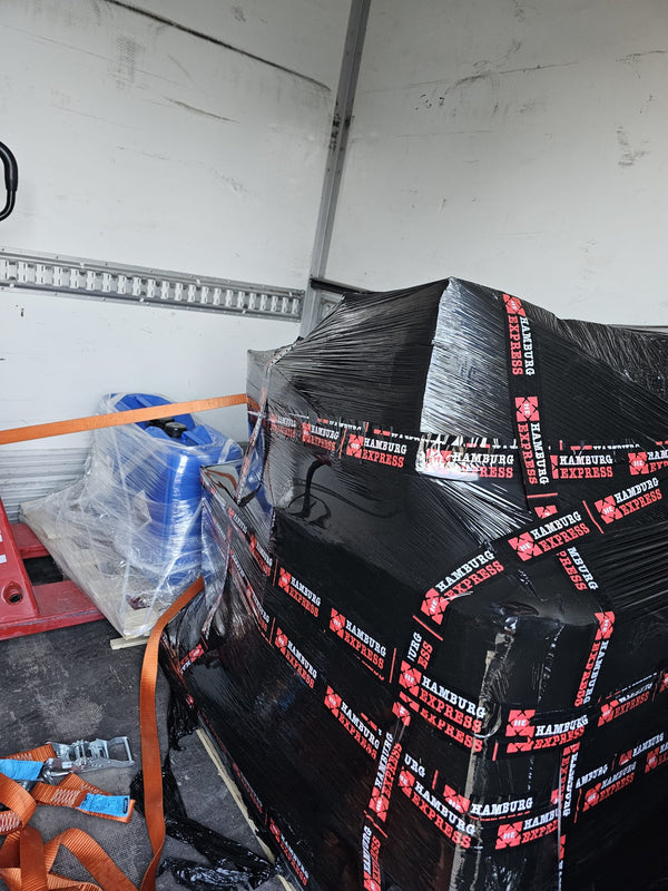 Verpakte palletlading in de bakwagen van Delta Express Transport